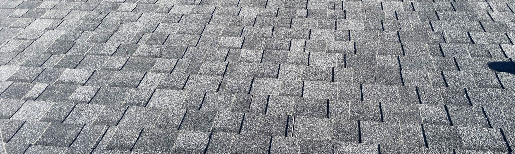 An upclose view of an asphalt shingle roof